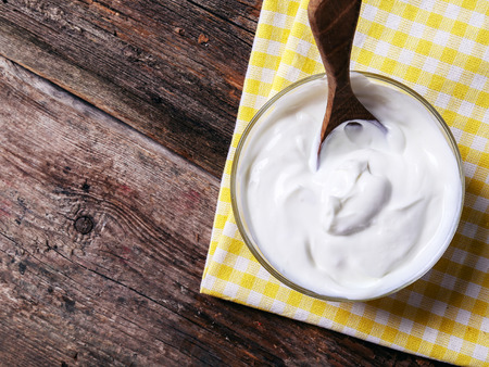 Greek Yogurt with spoon on table